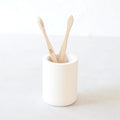 Selegna Diatomite Drying Stone Toothbrush Holder, Modern Ceramic-Look Countertop Cup with Drainage for Bathroom, Quick Drying Electric Toothbrush & Toothpaste Organizer, Stoneware Finish - color: Beige