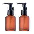 2Pcs 60ml 2oz Amber Frosted Glass Pump Bottles Lotion Dispenser Empty Refillable Travel Size Cosmetic Toiletries Sample Storage Container Vial Jar with Black Pump for Shampoo Cream