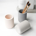 Selegna Diatomite Drying Stone Toothbrush Holder, Modern Ceramic-Look Countertop Cup with Drainage for Bathroom, Quick Drying Electric Toothbrush & Toothpaste Organizer, Stoneware Finish - color: Dark Grey
