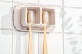 Silicone Suction Toothbrush Holder 2-Slot Wall Mounted Bathroom Organizer for Electric, Manual & Kids' Toothbrushes – Secure Suction Storage, Compact & Travel-Friendly – Sand Beige