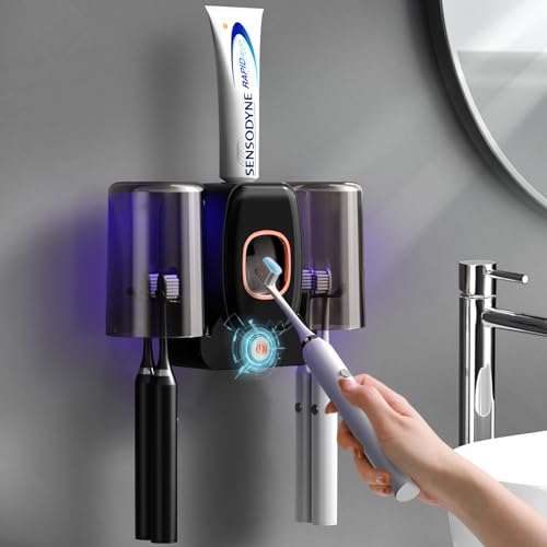 Toothbrush Holders for Bathrooms, Wekity Automatic Toothpaste Dispenser Space Saving Toothbrush and Toothpaste Holder，Toothbrush Holder Wall Mounted with 2 Cups for Bathroom (Black)… - color: Black