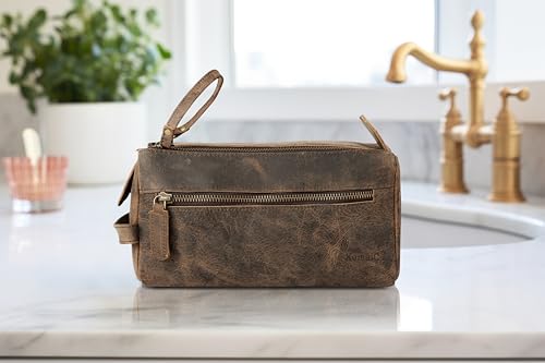 KomalC Premium Buffalo Leather Toiletry Bag for Men & Women With Water resistant Lining, Grooming Travel Pouch, Unisex Wash Bag for Toiletries, Gifts for Men and Women - color: Distressed Tan