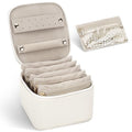 DesignSter Small Jewelry Box, Travel Small Jewelry Organizer with Earring Tray and Ring Holder, Square Travel Jewelry Storage Case with 6 Velvet Jewelry Pouches, Beige - color: Beige