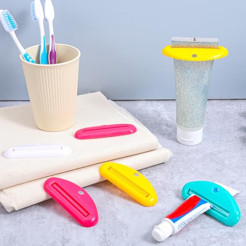 Bremorou 8 Pcs Toothpaste Squeezer Plastic Toothpaste Tube Squeezer Holder Clip Roller Tool for Bathroom Saving Facial Cleanser Creams Paint (Colorful)