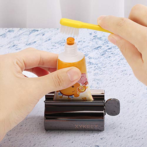 XYKEEY Toothpaste Tube Squeezer - Set of 2 Toothpaste Squeezer Rollers, Metal Toothpaste Tube Wringer Seat Holder Stand (Black) - color: Black